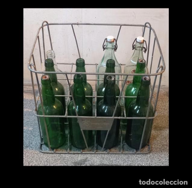 Otras Botellas y Bebidas Antiguas de colecci&oacute;n: Botellero vintage metal Leon