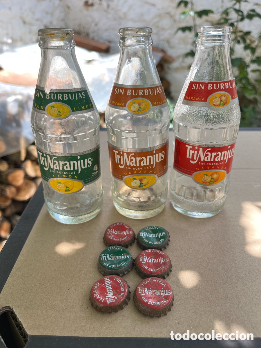Otras Botellas y Bebidas Antiguas de colecci&oacute;n: LOTE CHAPAS TAP&Oacute;N CORONA, y 3 BOTELLAS TRINARANJUS, sin burbujas.