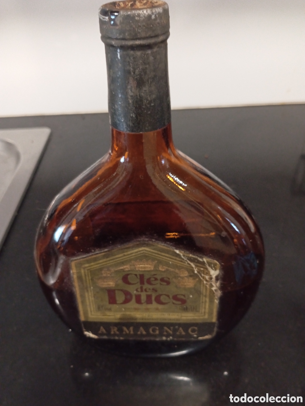 Otras botellas y bebidas antiguas de colecci&oacute;n: antigua botella de Armagnac Cles des Ducs