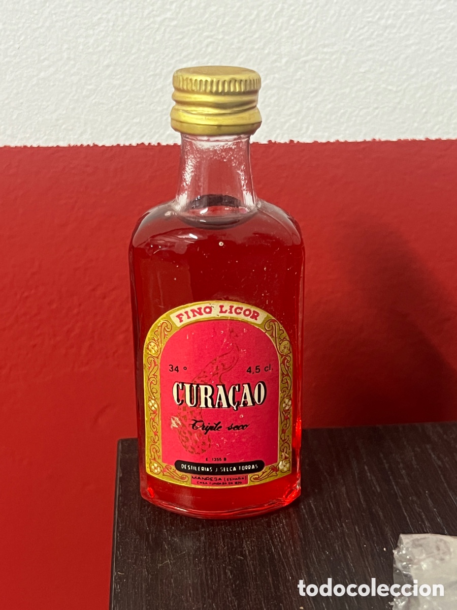 Otras botellas y bebidas antiguas de colecci&oacute;n: botellita fino licor cura&ccedil;ao