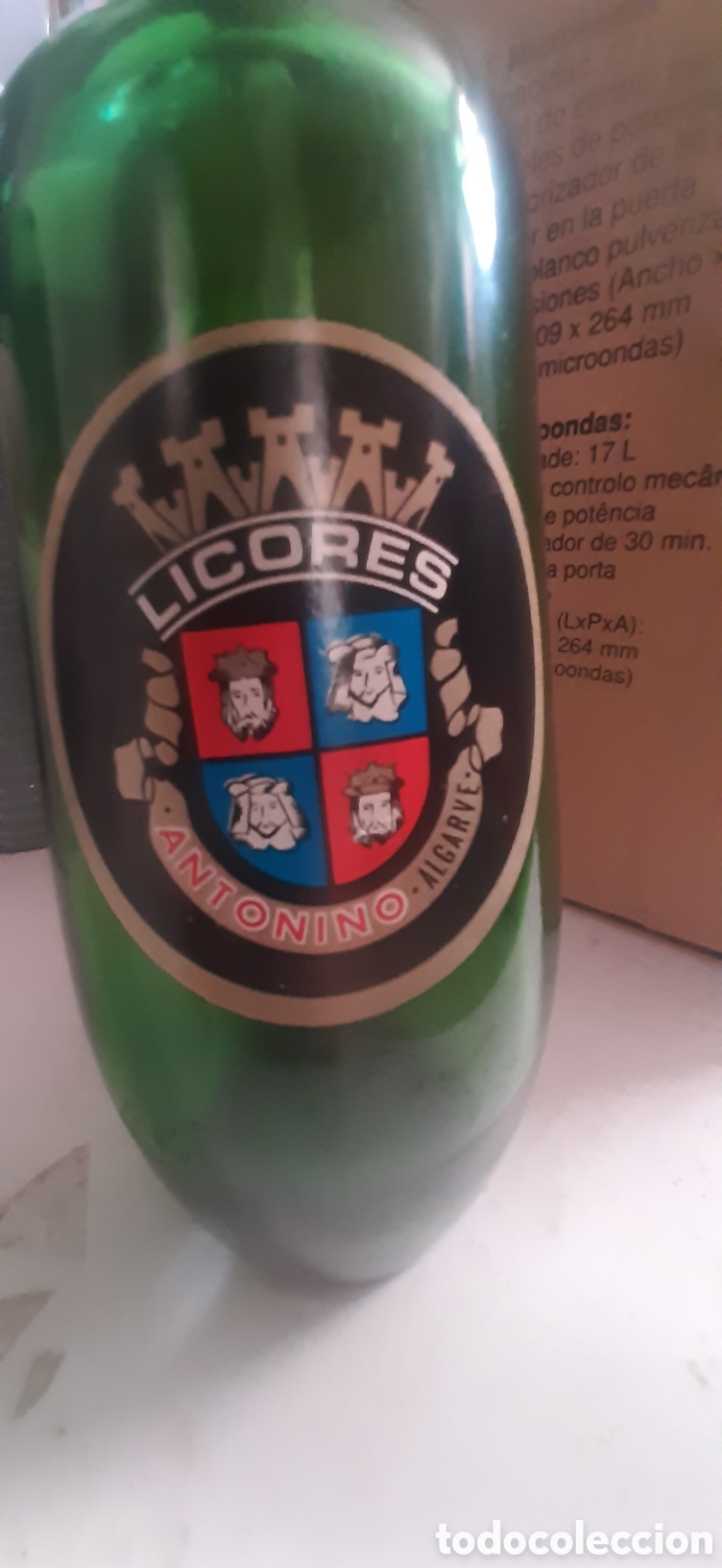 Otras botellas y bebidas antiguas de colecci&oacute;n: Antonino botella licor portugu&eacute;s vac&iacute;a