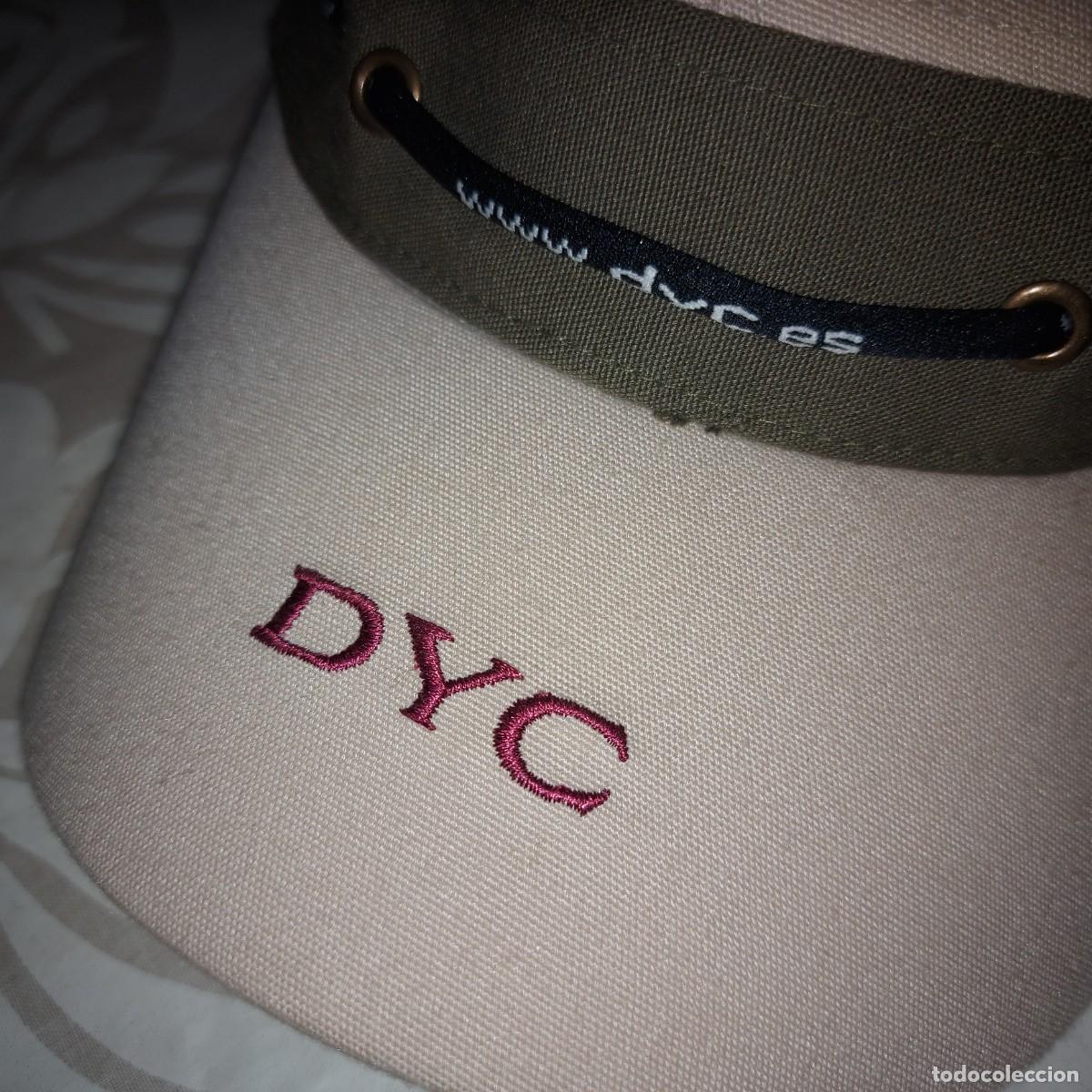 Otras botellas y bebidas antiguas de colecci&oacute;n: DYC WHISKY, GORRA PUBLICIDAD, A ESTRENAR