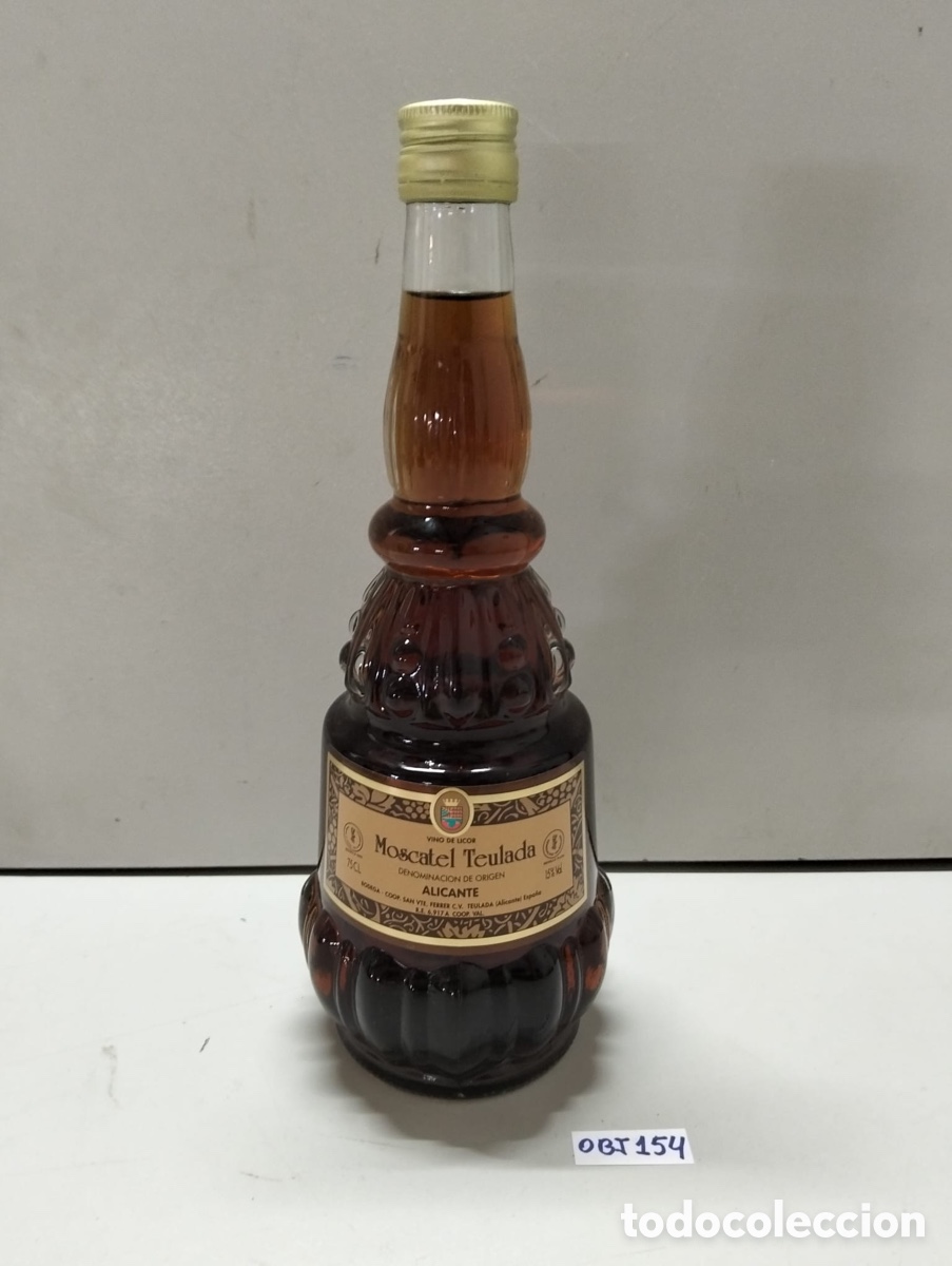 Otras botellas y bebidas antiguas de colecci&oacute;n: Moscatel Teulada es un vino dulce de licor (mistela)