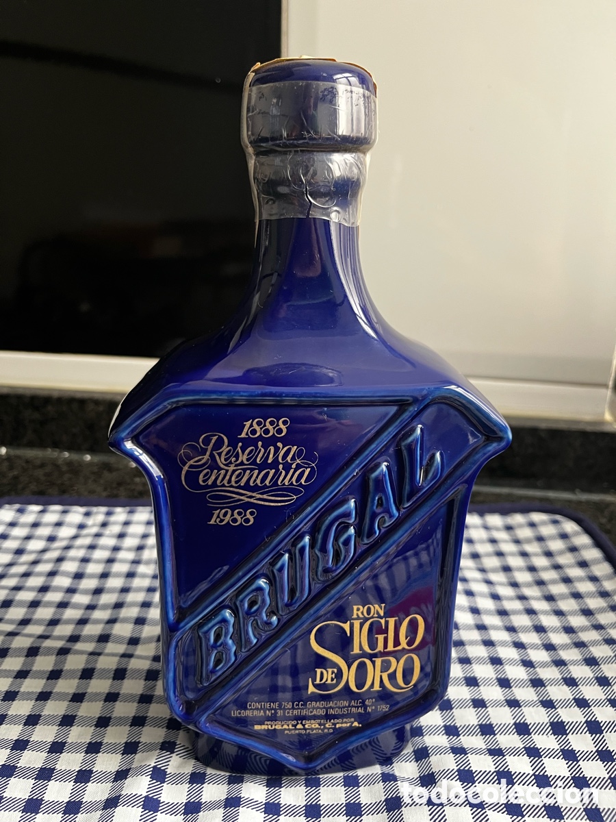 Otras botellas y bebidas antiguas de colecci&oacute;n: Botella especial centenario siglo de oro Brugal