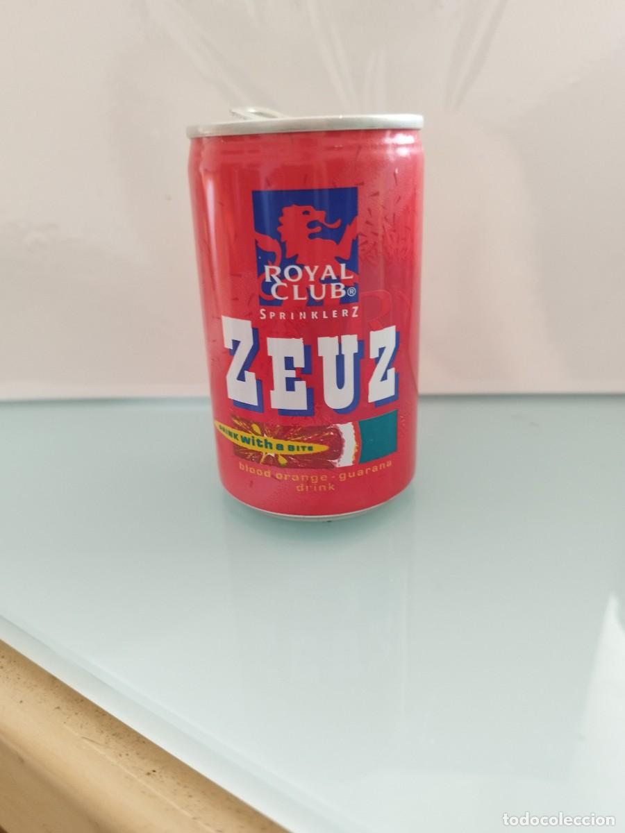 Otras botellas y bebidas antiguas de colecci&oacute;n: Lata vac&iacute;a de la bebida Royal Club Sprinklerz Zeuz con sabor a naranja sanguina y guaran&aacute;.