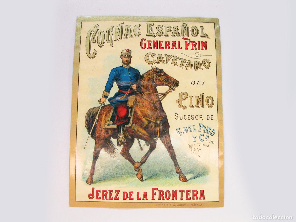Otras botellas y bebidas antiguas de colecci&oacute;n: ANTIGUA ETIQUETA DE COGNAC ESPA&Ntilde;OL GENERAL PRIM. CAYETANO DEL PINO. JEREZ DE LA FRONTERA