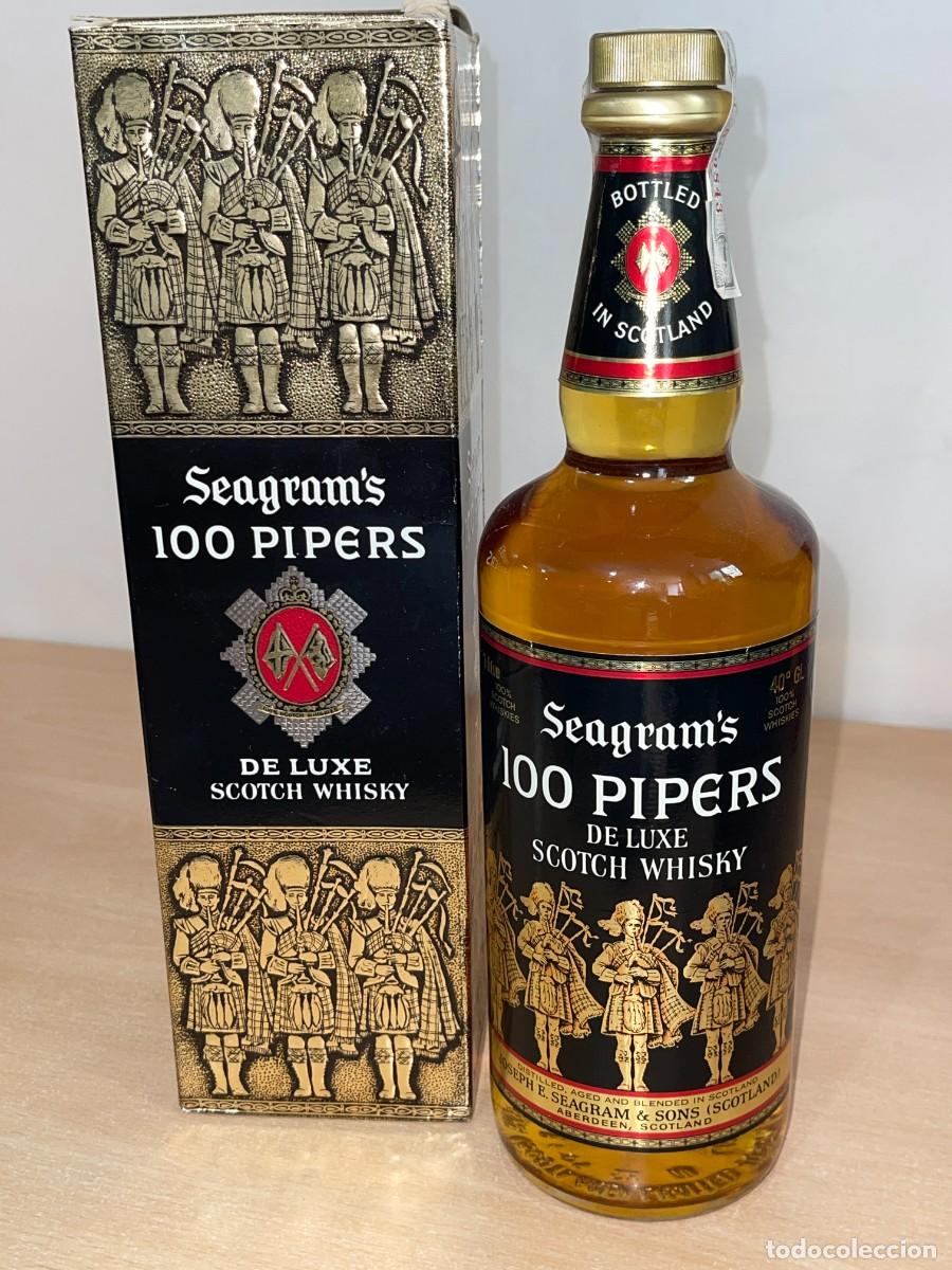 Otras botellas y bebidas antiguas de colecci&oacute;n: Antigua Botella Whisky Seagram's 100 PIPERS De Luxe Scotch Whisky Bottled in Scotland 1 Litre