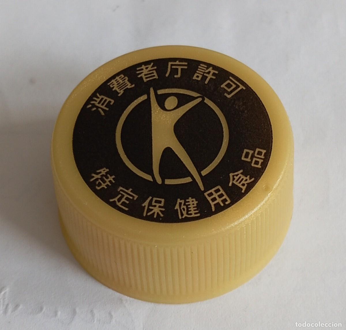 Otras botellas y bebidas antiguas de colecci&oacute;n: PEDIDO M&Iacute;NIMO 5 EUROS Tap&oacute;n rosca pl&aacute;stico Jap&oacute;n KIRIN METS COLA ABSORBE GRASAS.