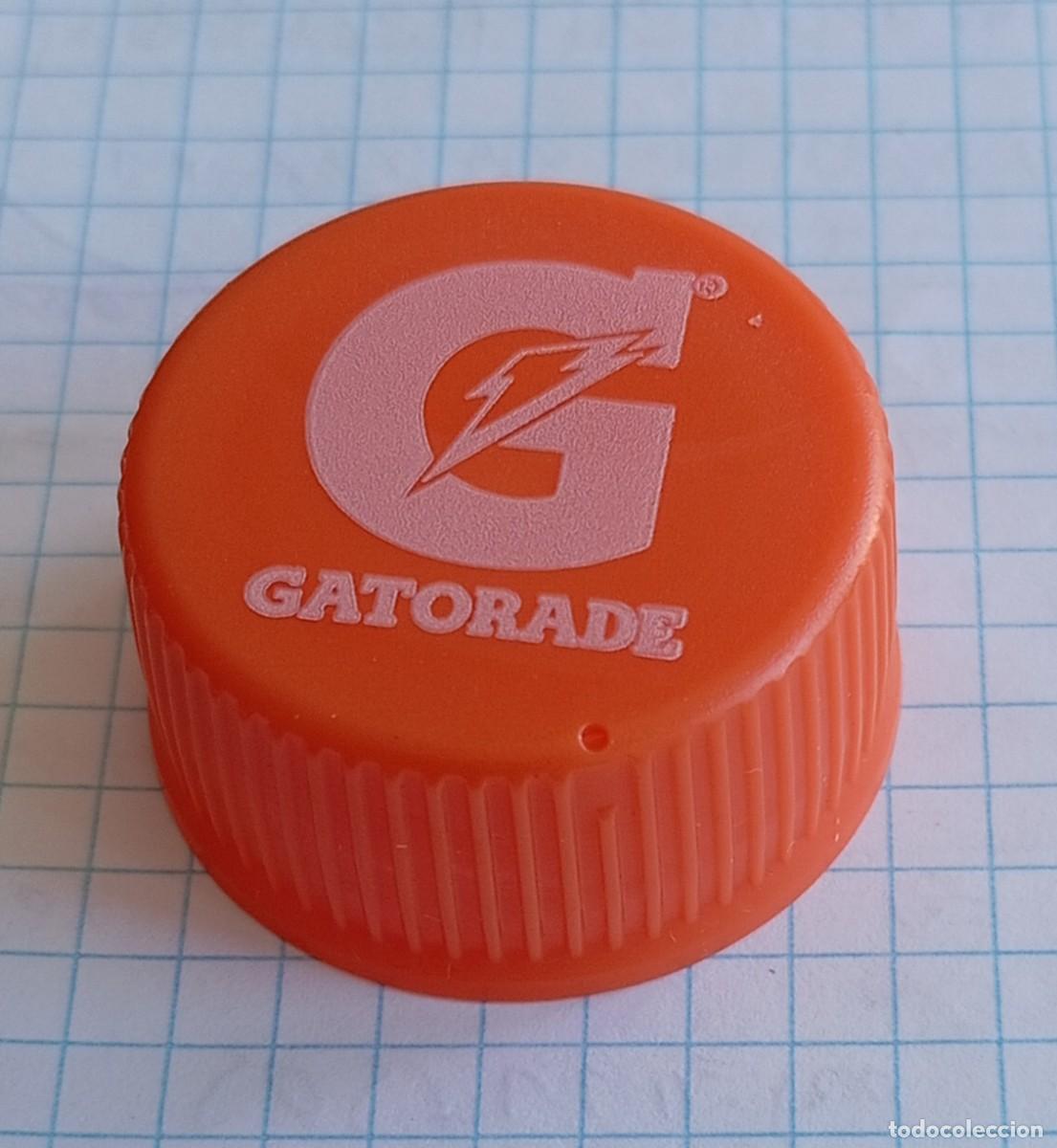 Otras botellas y bebidas antiguas de colecci&oacute;n: PEDIDO M&Iacute;NIMO 5 EUROS. TAP&Oacute;N ROSCA PL&Aacute;STICO COREA DEL SUR: Gatorade sabor naranja.