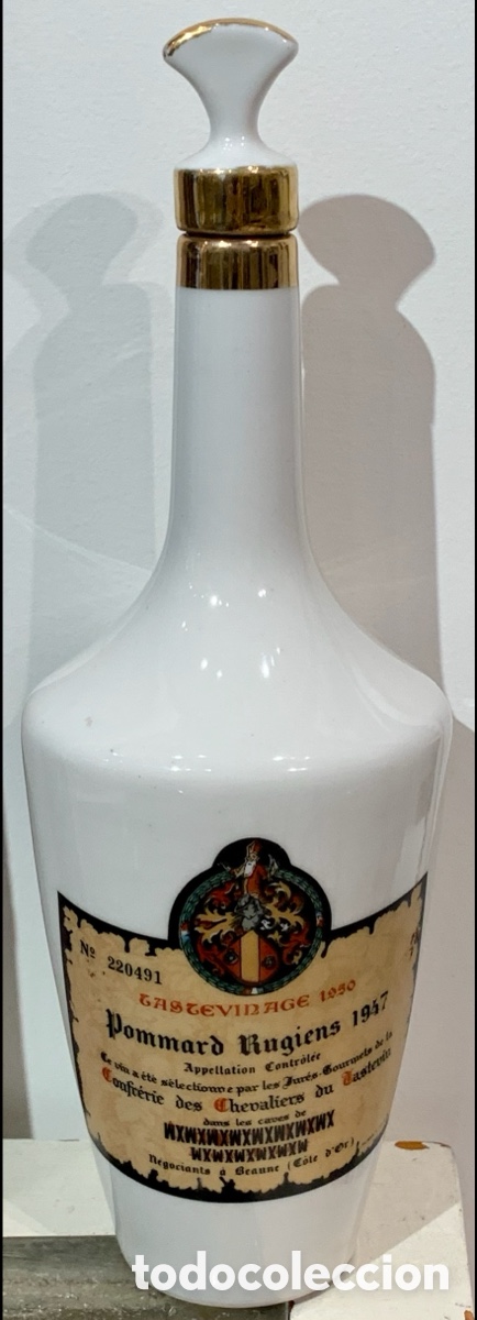 Otras botellas y bebidas antiguas de colecci&oacute;n: Botella de porcelana numerada. TASTEVINAGE 1950. Pommard Rugiens. 1947.