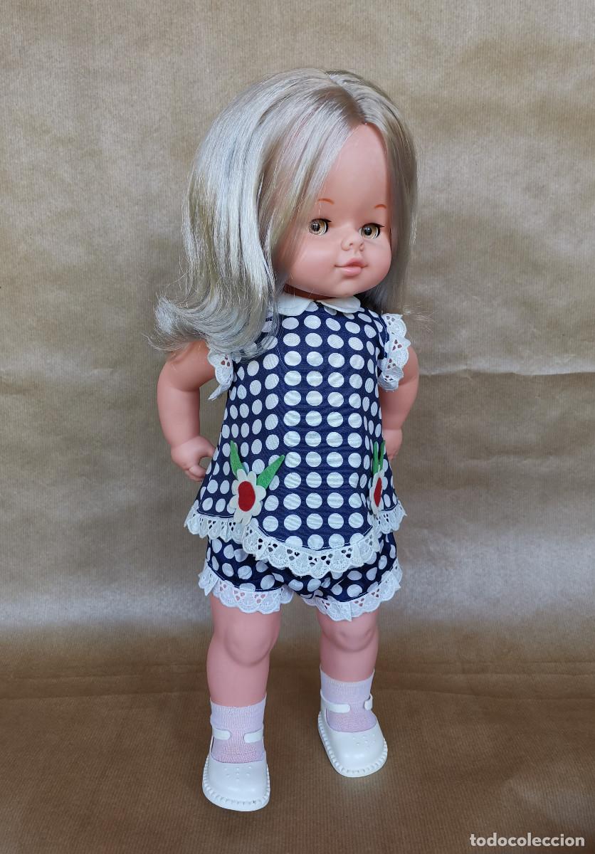 Muñeca dolly cheap de famosa