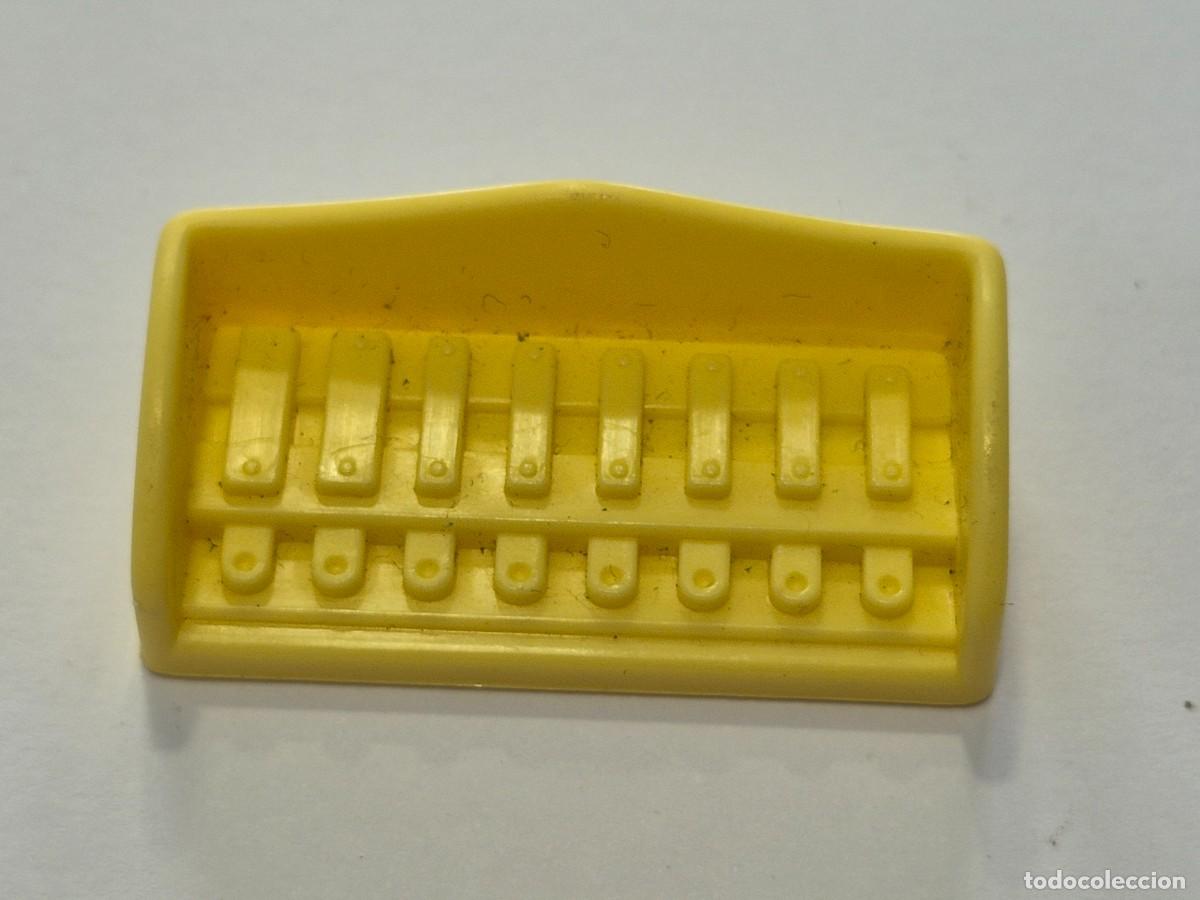 Otras Mu&ntilde;ecas de Famosa cl&aacute;sicas y de colecci&oacute;n: pin y pon teclado chimenea