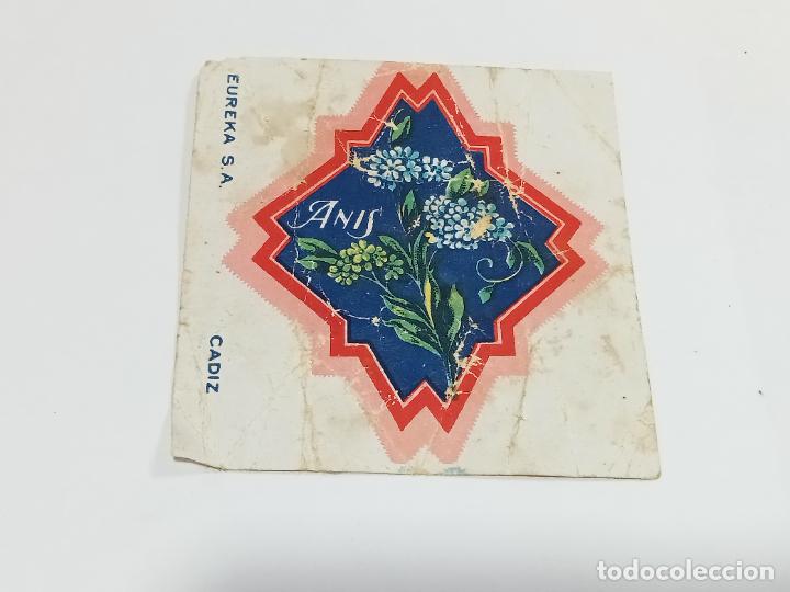 Sammelleidenschaft Andere Papierartikel: ANTIGUO ENVOLTORIO DE CARAMELOS. AN&Iacute;S. EUREKA S.A. C&Aacute;DIZ. 6.5 X 7 CM.