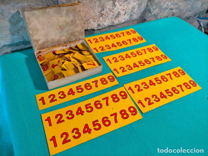 Otros Art&iacute;culos de Coleccionismo en Papel: Lote de n&uacute;meros antiguos de diferentes tipos y medidas amarillos rojos de tienda colmado carniceria