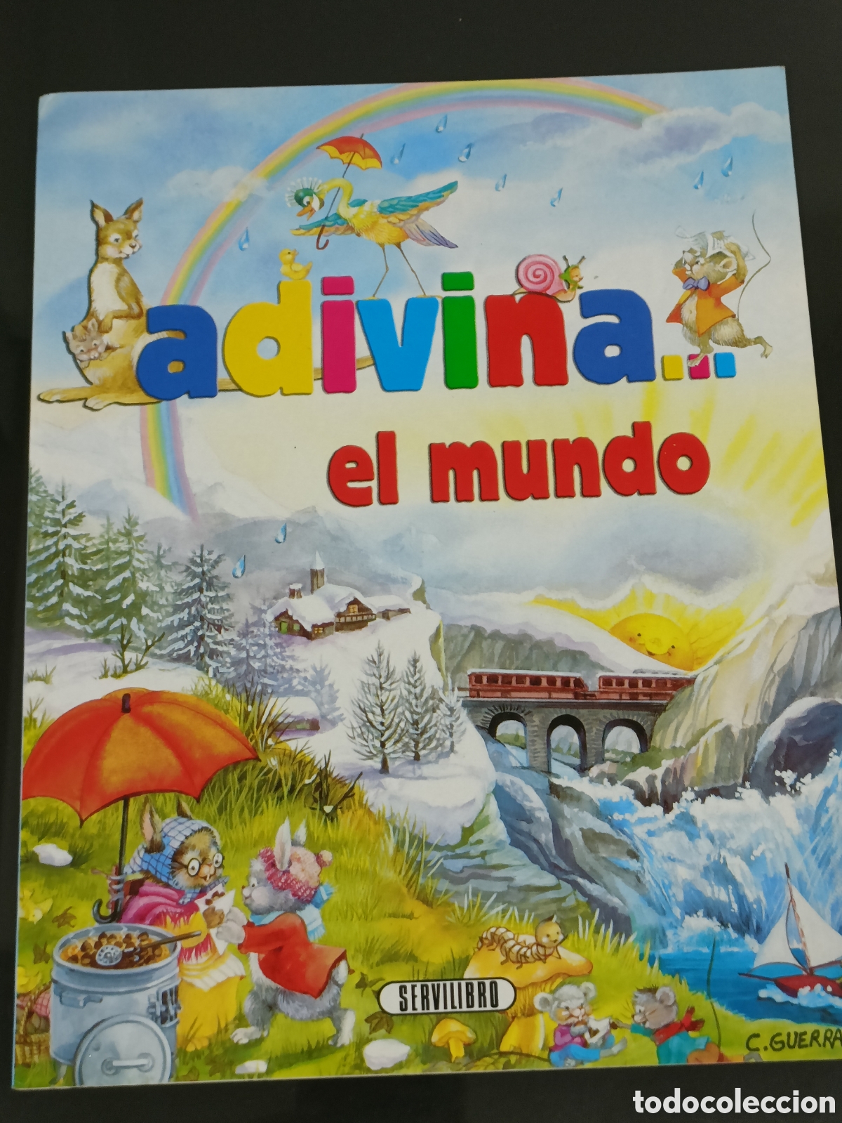 Otros Art&iacute;culos de Coleccionismo en Papel: Libro &rdquo;Adivina el mundo&rdquo; de la editorial Servilibro ilustrado por Carmen Guerra.