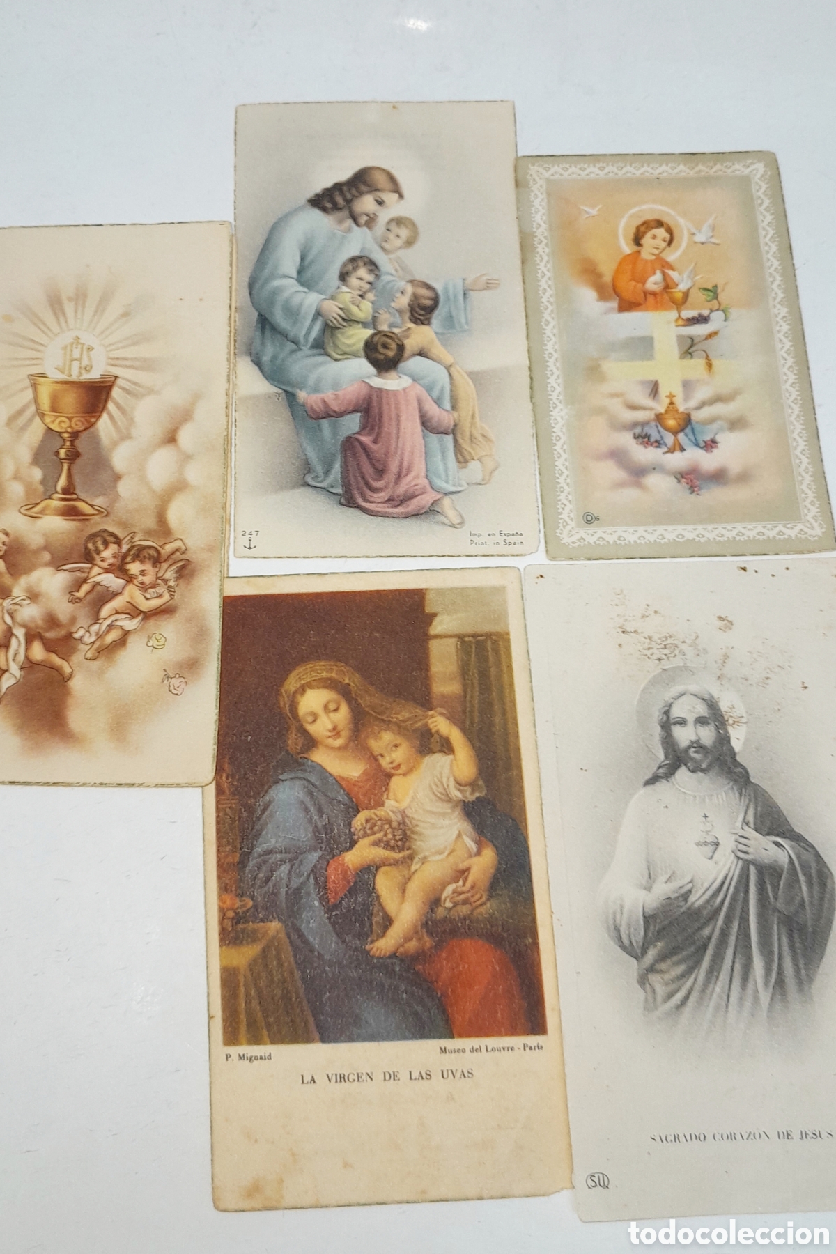 Otros art&iacute;culos de coleccionismo en papel: Lote de cinco recordatorios de comunion de la iglesia de Almoradi