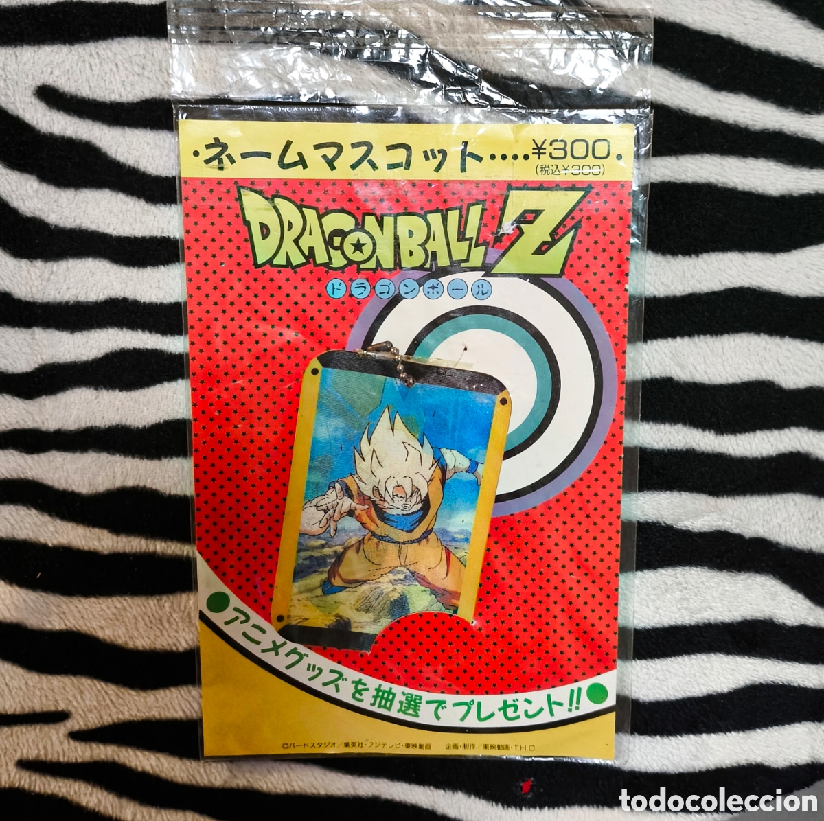 Otros art&iacute;culos de coleccionismo en papel: Llavero lenticular Dragon Ball Z - Name Mascot Goku Super Saiyan - Toei Animation 1992 Jap&oacute;n