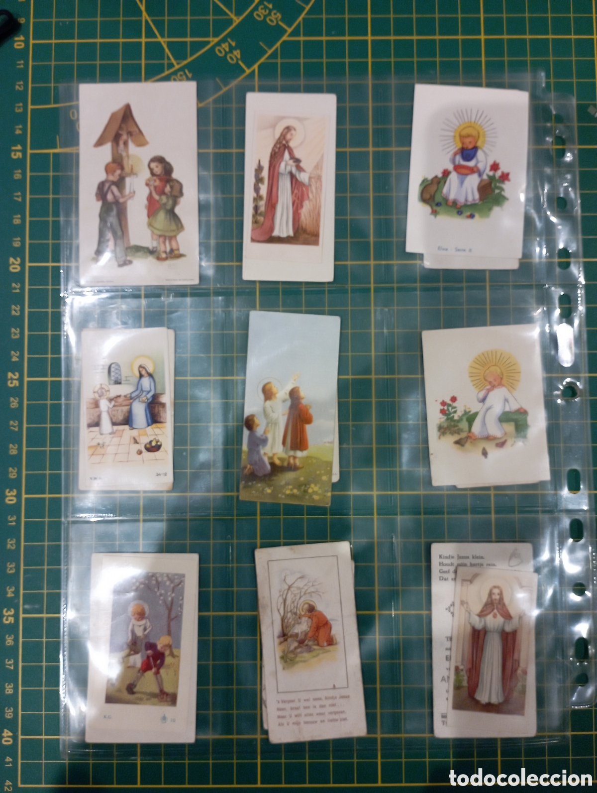 Otros art&iacute;culos de coleccionismo en papel: lote 9 estampas religiosas en hoja plastificada