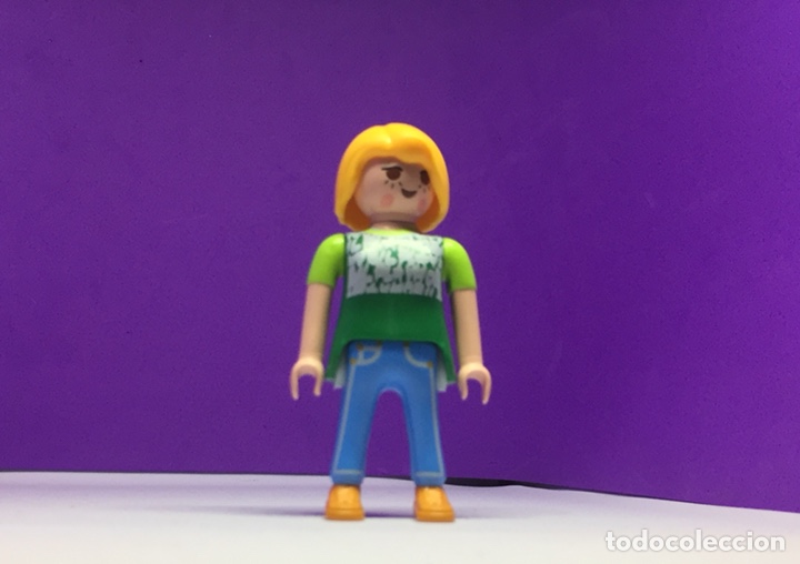 Playmobil chica tejanos