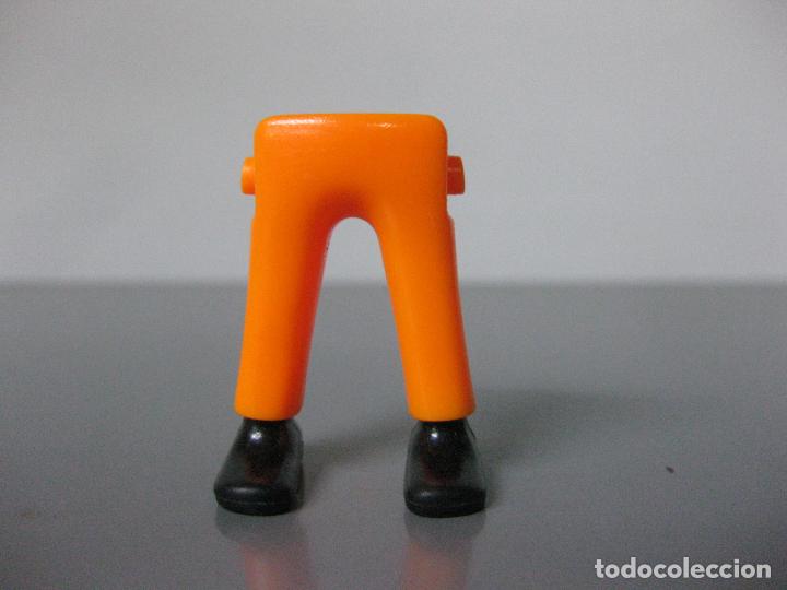 Playmobil: playmobil pierna recambio pantalon naranja PR1