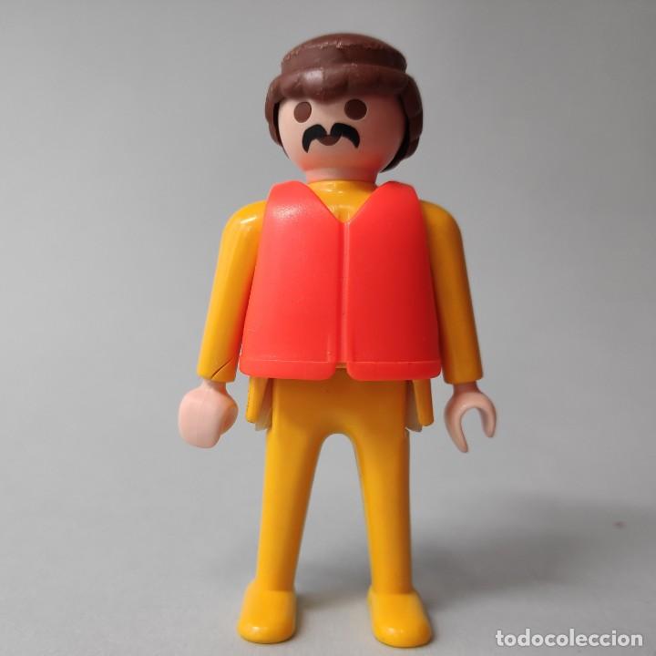 Playmobil: Playmobil Mu&ntilde;eco amarillo/naranja
