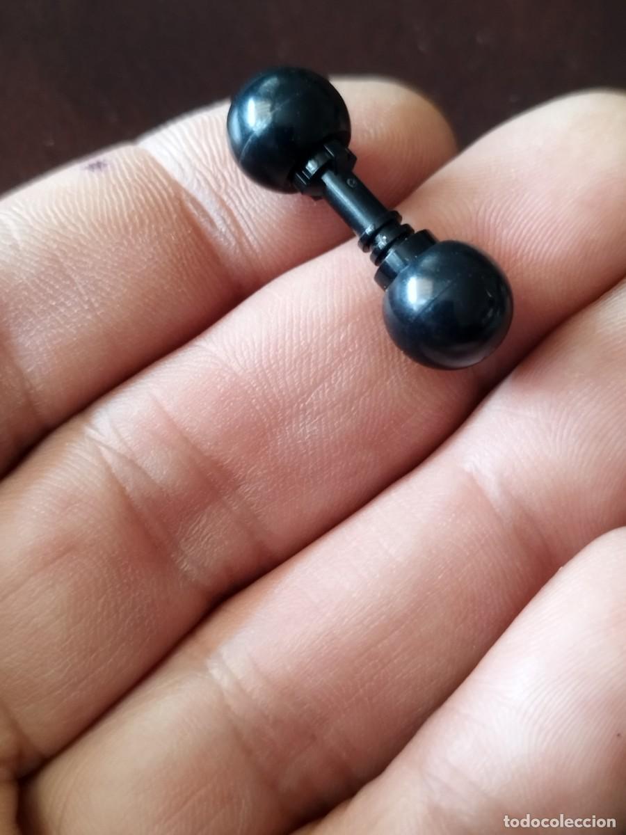 Playmobil: Figura Playmobil, adaptador de doble bola? A identificar.