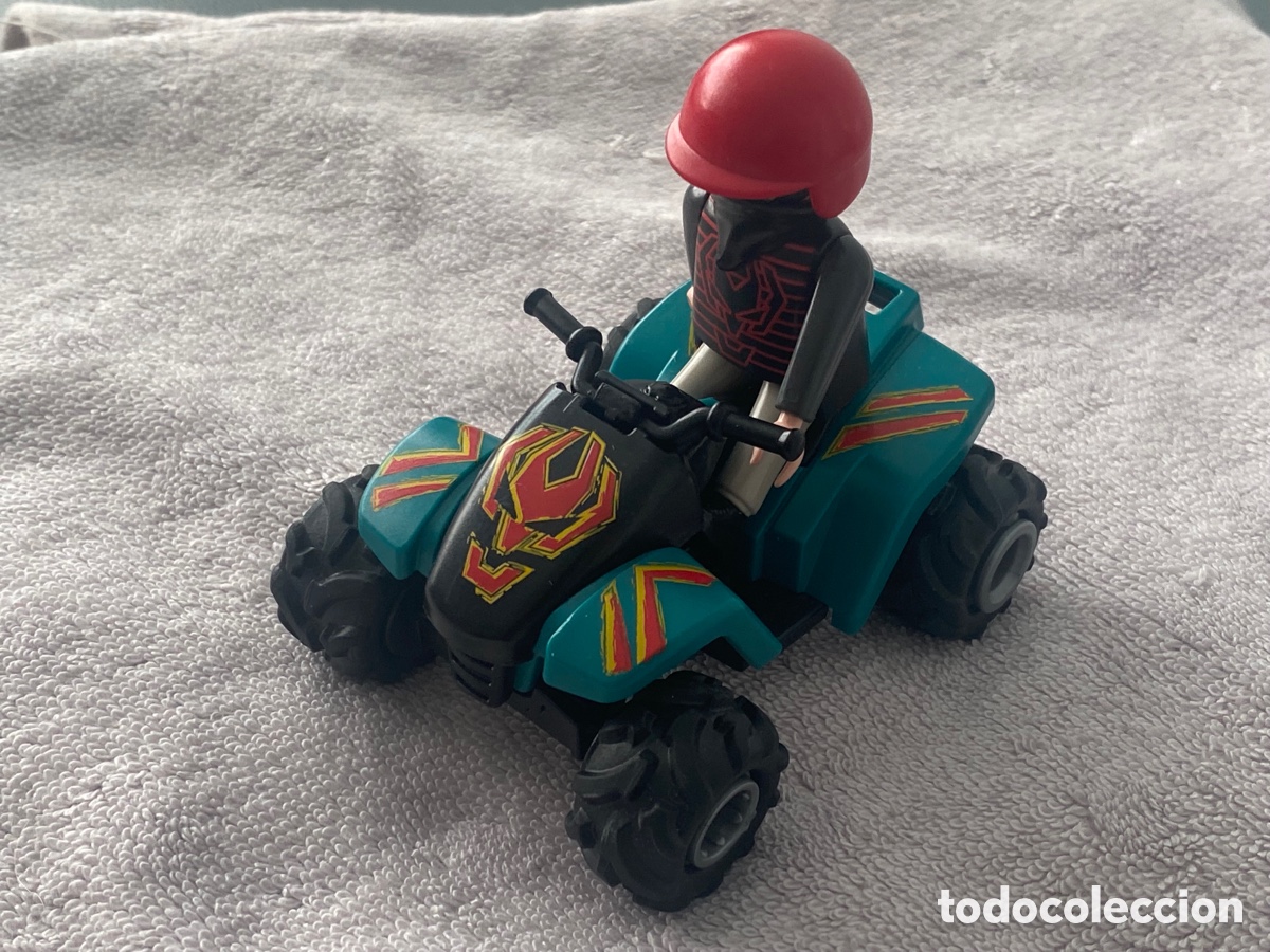 PLAYMOBIL LADR&Oacute;N EN QUAD