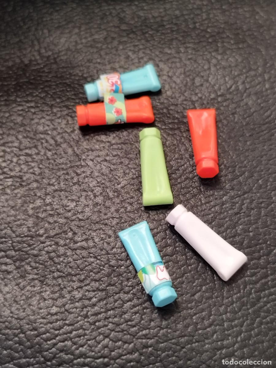 Playmobil: Figura Playmobil. Seis tubos de pasta de dientes o de comida.