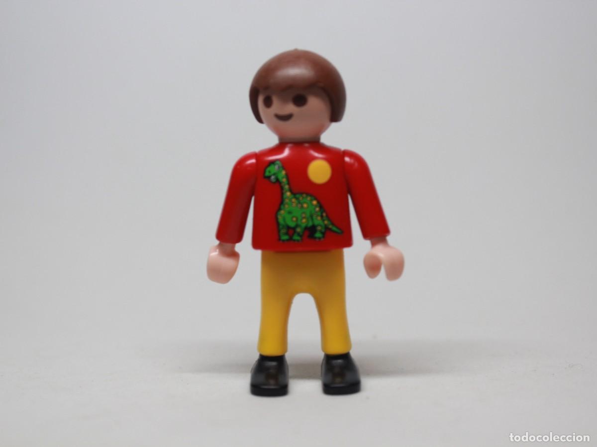 Playmobil: Figura ni&ntilde;o playmobil camiseta roja dinosaurio pantal&oacute;n amarillo botas negras a&ntilde;o 1995