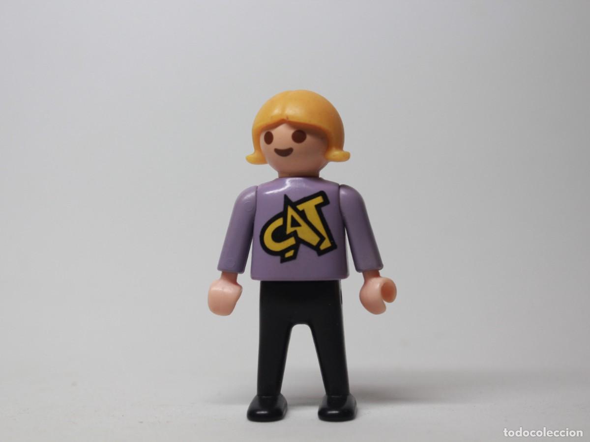 Playmobil: Figura ni&ntilde;o playmobil camiseta lila logo CAT pantal&oacute;n negro a&ntilde;o 1981