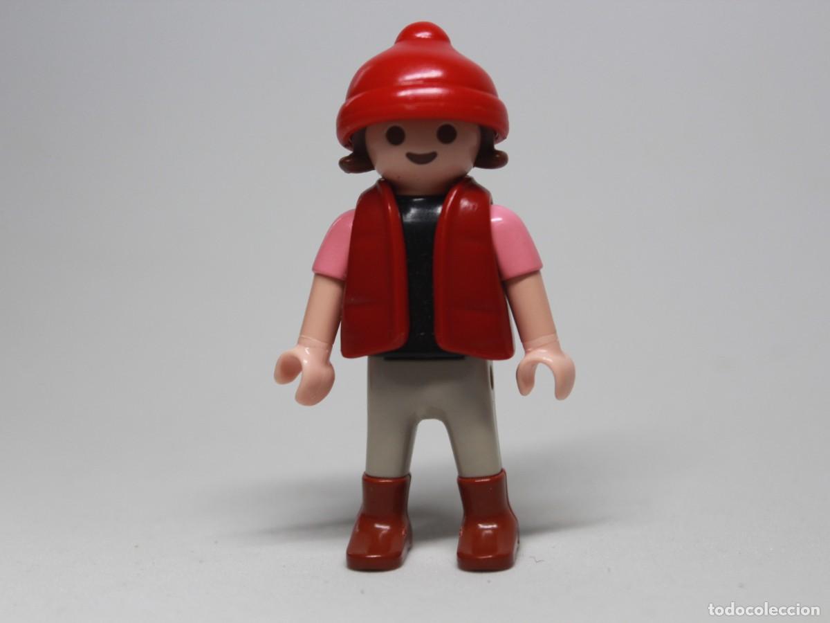 Playmobil: Ni&ntilde;a Playmobil con gorro rojo, chaleco y botas a&ntilde;o 1992