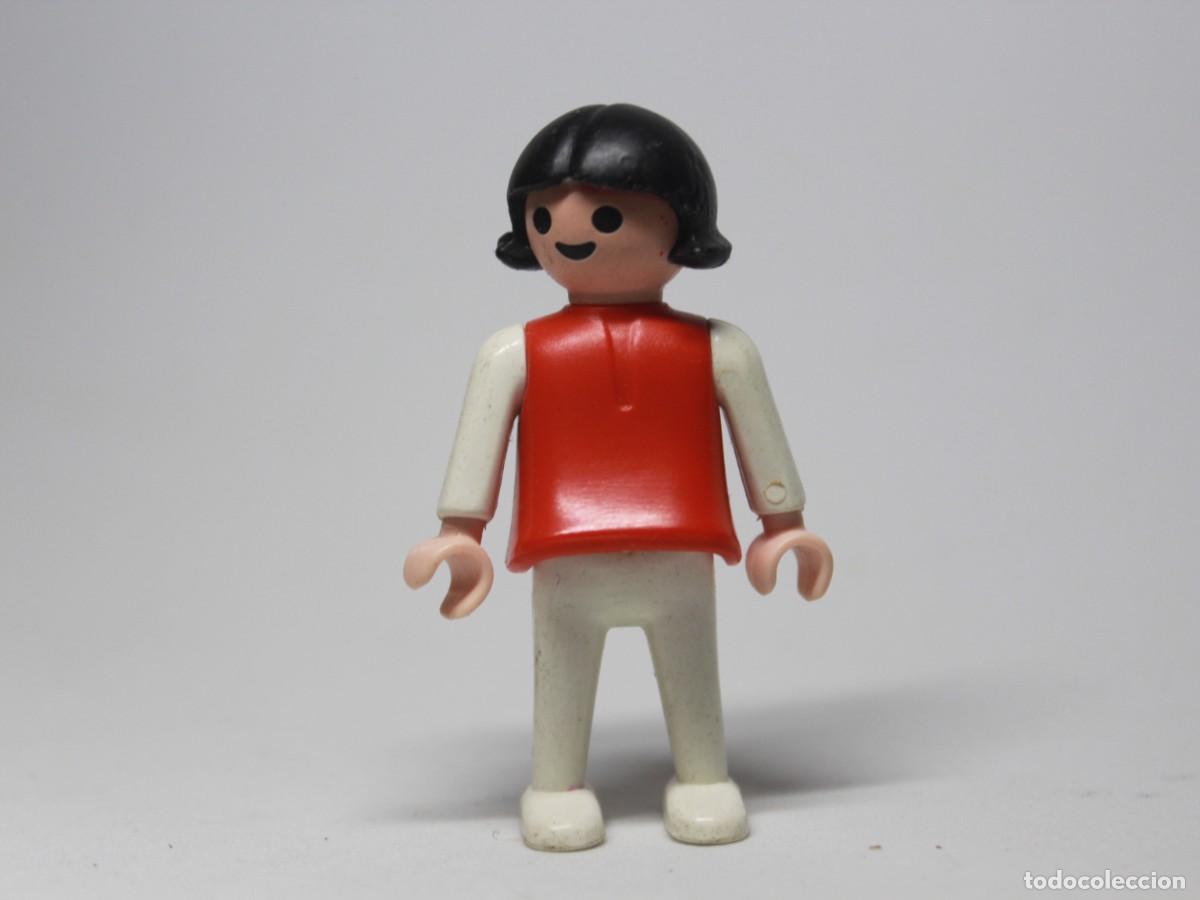 Playmobil: Ni&ntilde;a Playmobil con camiseta roja y pantal&oacute;n claro a&ntilde;o 1981