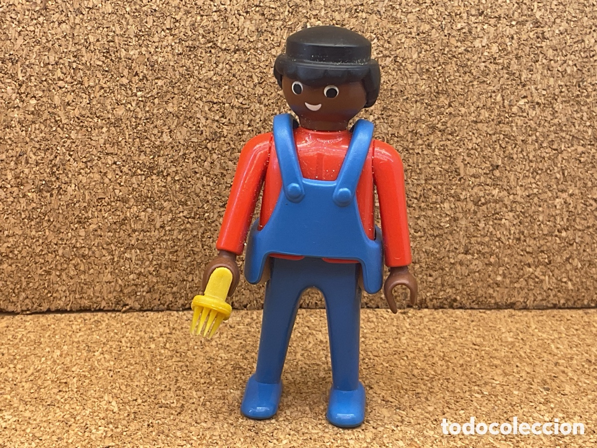 Playmobil: FIGURA PLAYMOBIL. GRANJERO CON PETO AZUL.