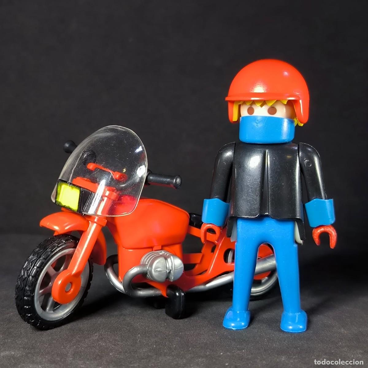 Playmobil: Playmobil motero con moto roja ☼