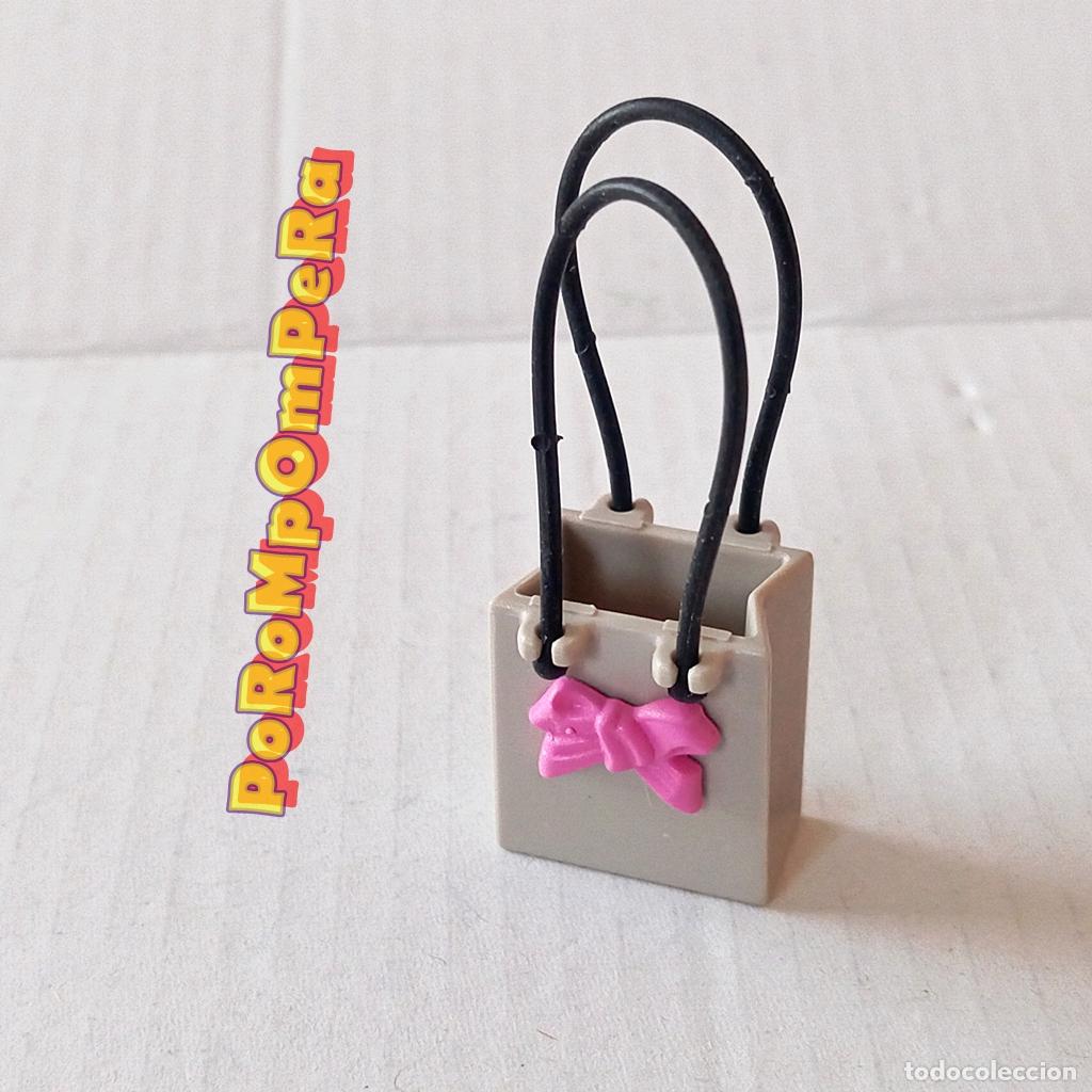 Playmobil: PLAYMOBIL BOLSA GRIS CON LAZO ROSA Y ASAS DE GOMA NEGRAS - SET/S POR DETERMINAR T8