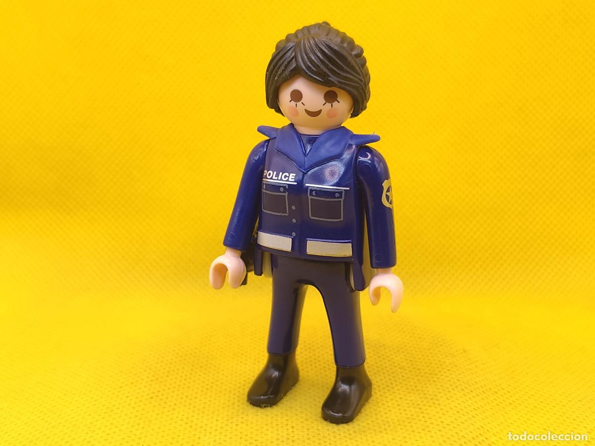 Playmobil: Playmobil Mujer polic&iacute;a con uniforme azul y pistola