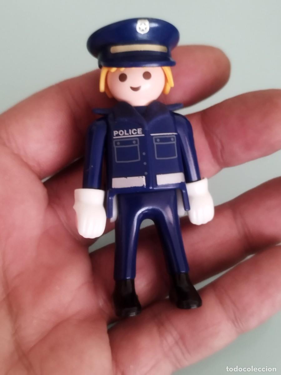 Playmobil: Figura Playmobil, agente de polic&iacute;a. Guantes chaleco y gorra de plato.
