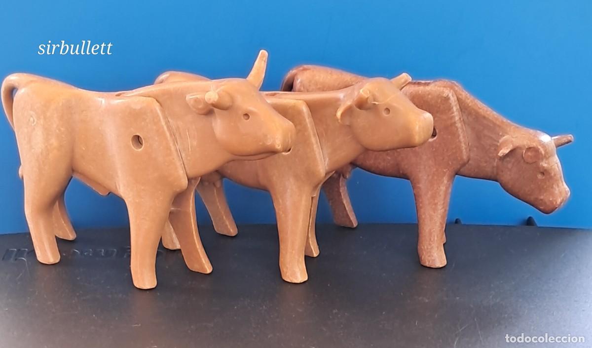 Playmobil: 1 toro y 2 vacas con defecto en los cuernos