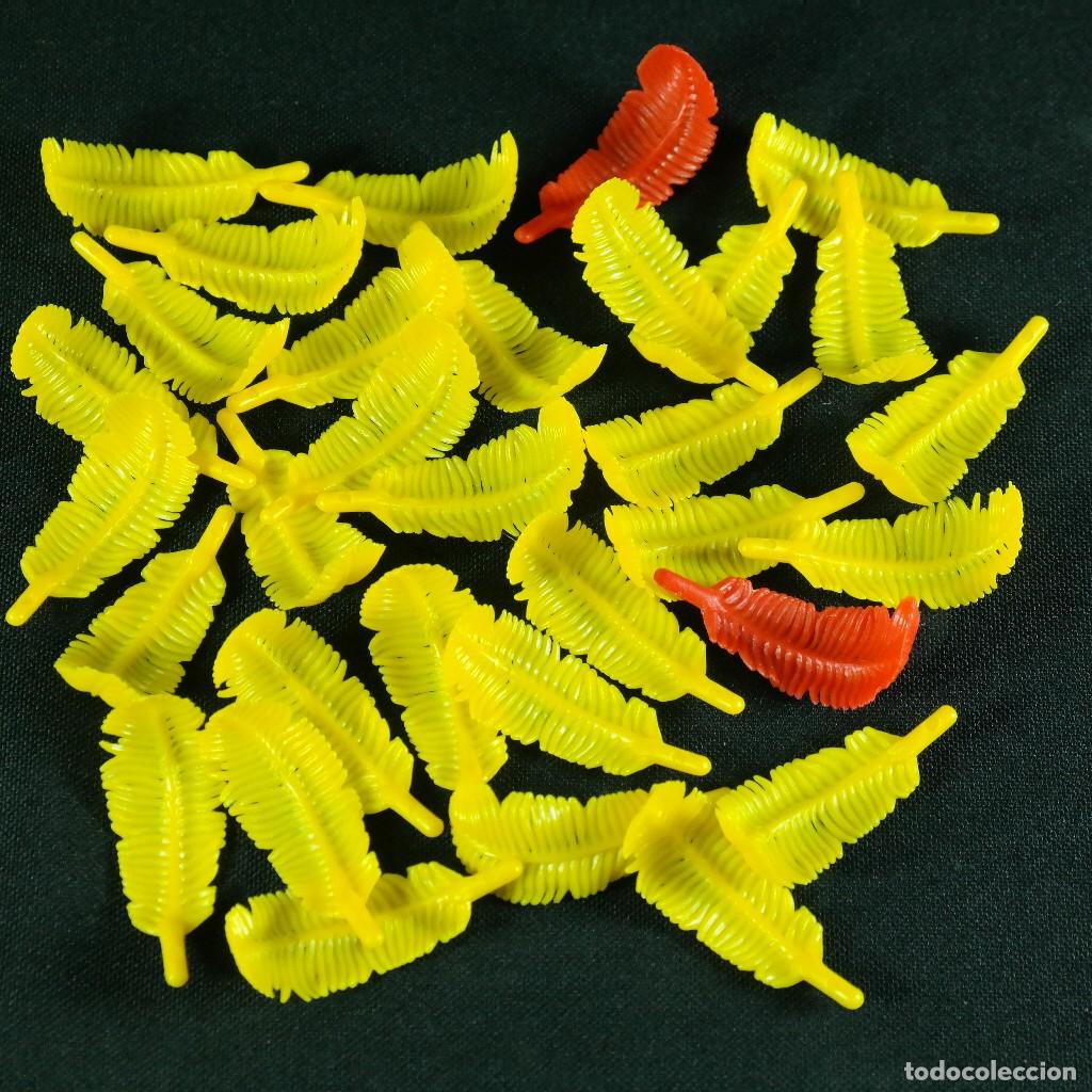 Playmobil: Playmobil plumas amarillas y rojas☼
