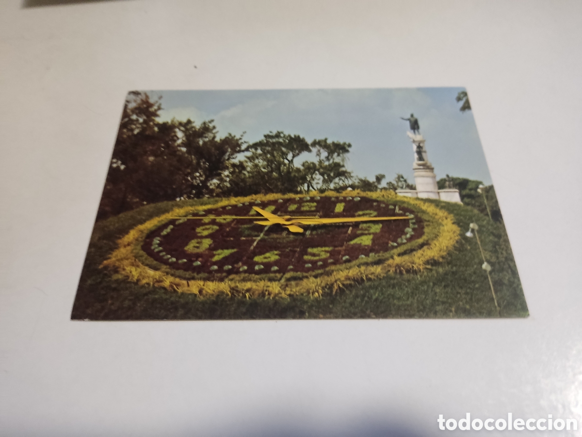 Postales: Postal monumento a Crist&oacute;bal Col&oacute;n,con reloj floral