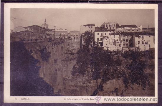 Postales: POSTAL FOTOGRAFICA DE RONDA - EL TAJO DESDE EL PUENTE NUEVO - FOTO L. ROISIN