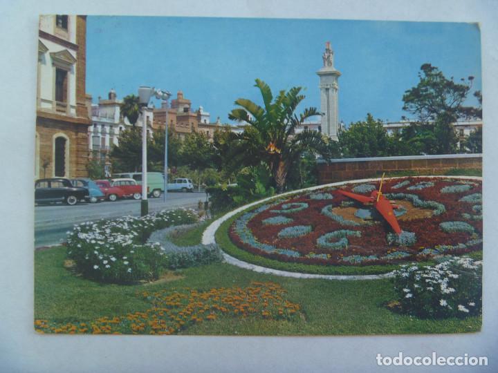 Postales: POSTAL DE CADIZ : PLAZA DE ESPA&Ntilde;A Y RELOJ DE FLORES. A&Ntilde;OS 60