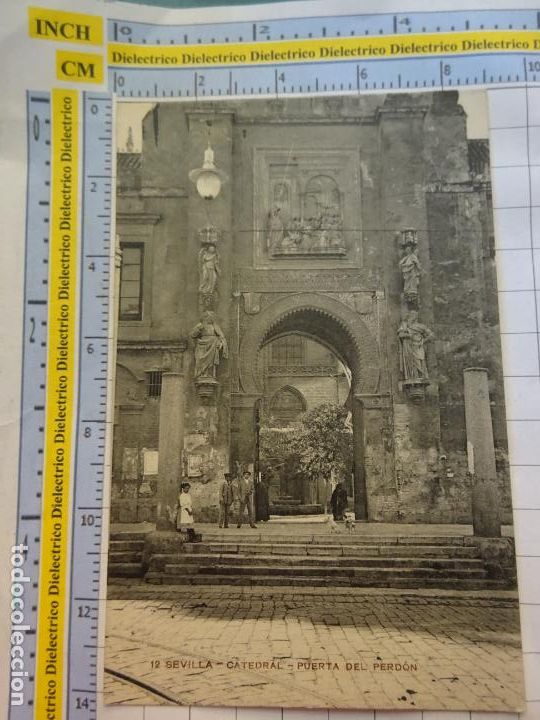 Postais: POSTAL DE SEVILLA. A&Ntilde;OS 10 30. CATEDRAL PUERTA DEL PERD&Oacute;N 12 MISS&Eacute;. NI&Ntilde;OS PERROS. 1622