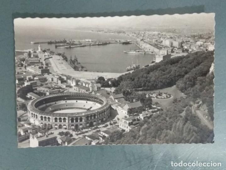 Postales: POSTAL MALAGA - PLAZA DE TOROS Y VISTA GENERAL DEL PUERTO.
