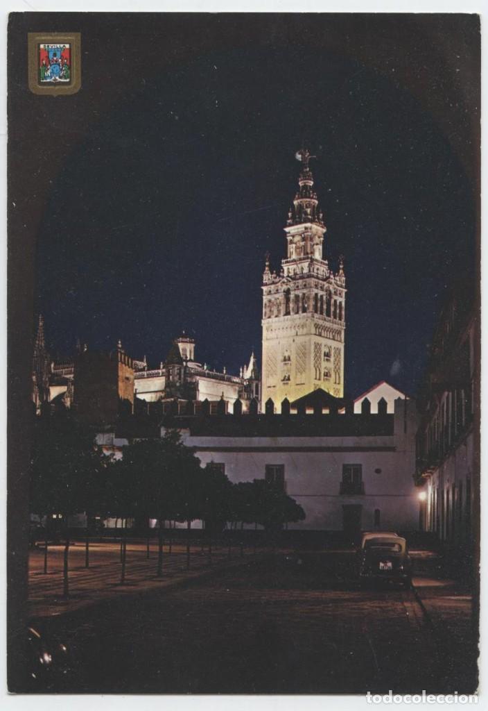 Postales: N&ordm; 56-SEVILLA. Patio de Banderas y la Giralda. Vista nocturna. Sin circular. ED. DOM&Iacute;NGUEZ