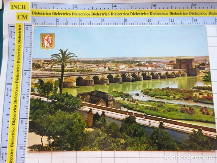 Cartoline: POSTAL DE C&Oacute;RDOBA. A&Ntilde;O 1964. PUENTE ROMANO Y CAMPO DE LA VERDAD 701 ESCUDO ORO. 52