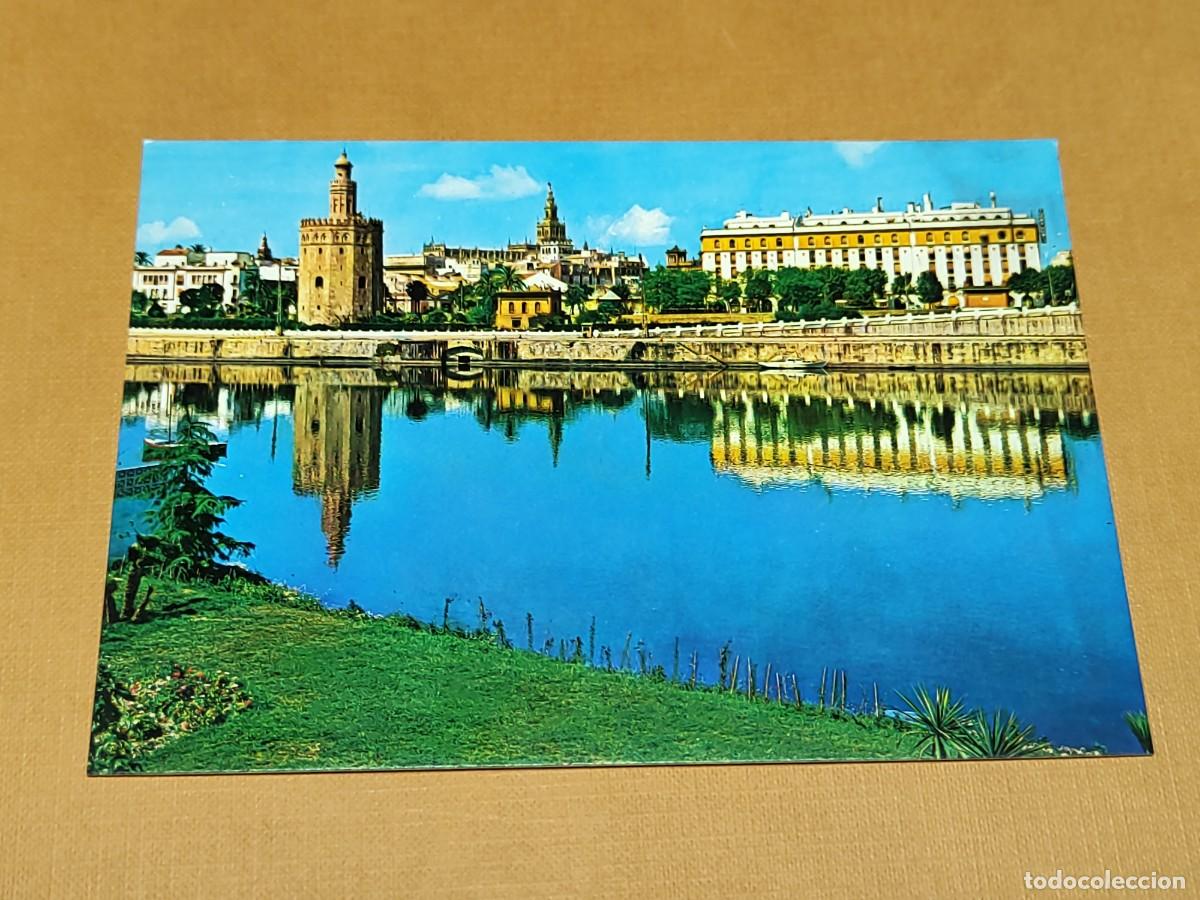 Postales: SEVILLA.-N⁰ 114 R&iacute;o Guadalquivir y vista parcial. Tarjeta sin circular, antigua. Ed. ARRIBAS