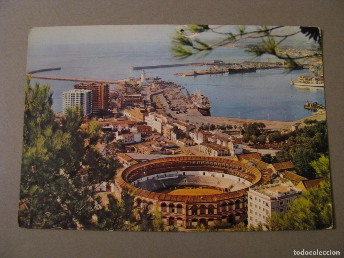 Postales: POSTAL DE MALAGA. PLAZA DE TOROS Y VISTA PARCIAL DEL PUERTO. RO-FOTO. ESCRITA.