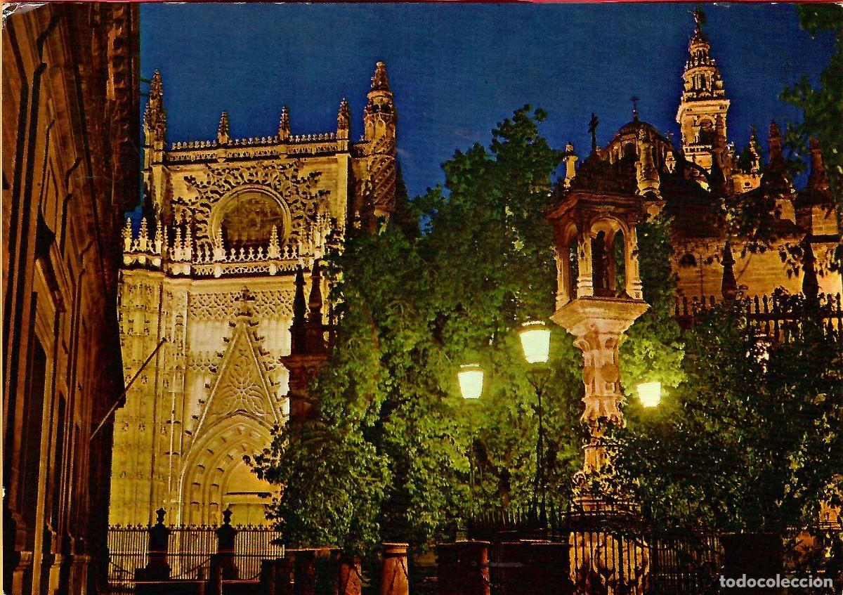 Postales: N&ordm; 211-SEVILLA. Vista parcial de la Catedral. Puerta del Principio (nocturna). Circulada en 1973. ED