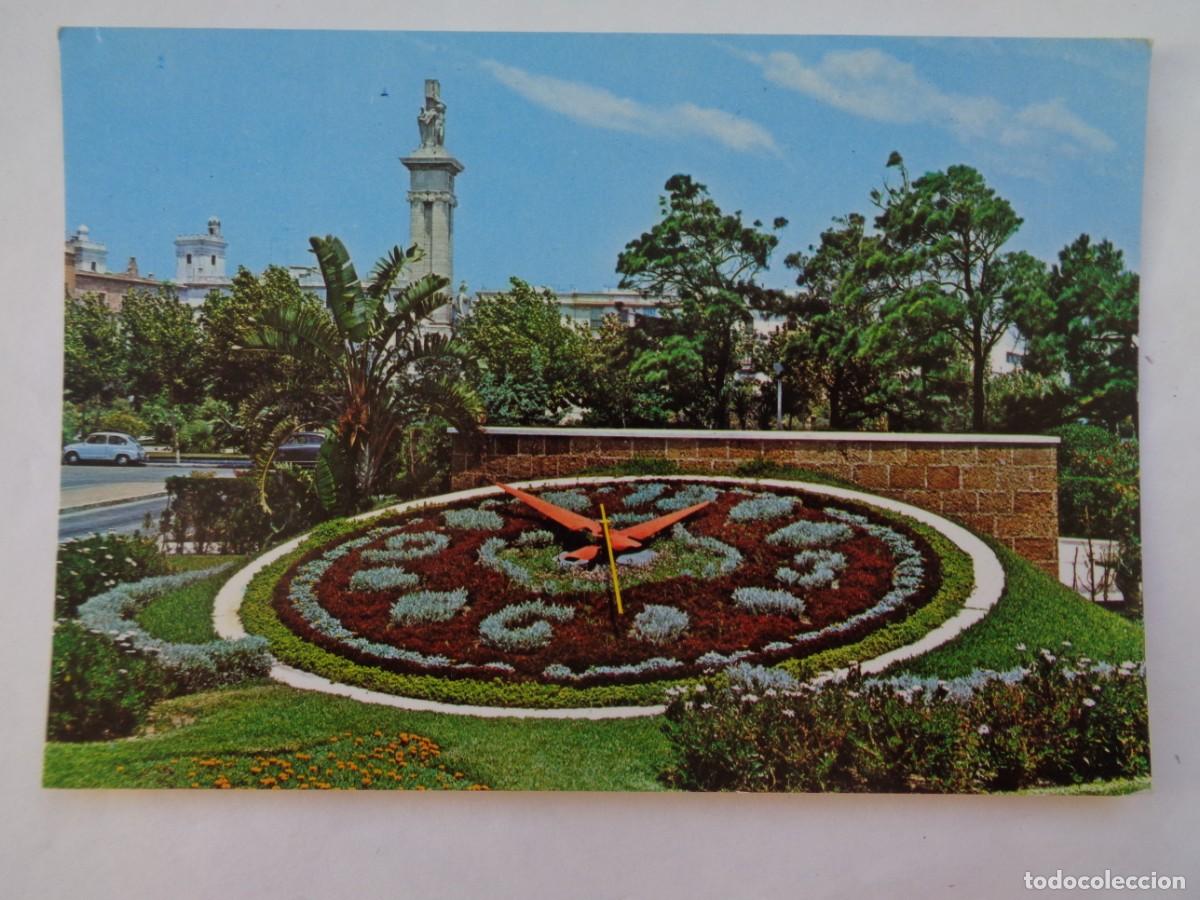 Postales: POSTAL DE CADIZ : PLAZA DE ESPA&Ntilde;A Y RELOJ DE FLORES . A&Ntilde;OS 60